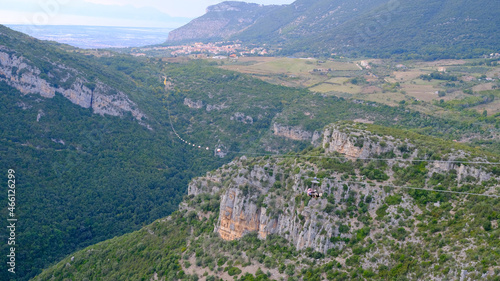 panorama of Trentinara, rope for the angel's flight and people flying. Trentinara, Cilento, Italy. photo