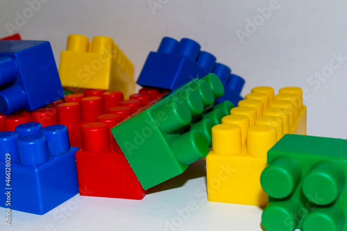 a multi-colored children's designer is lying on a white light table