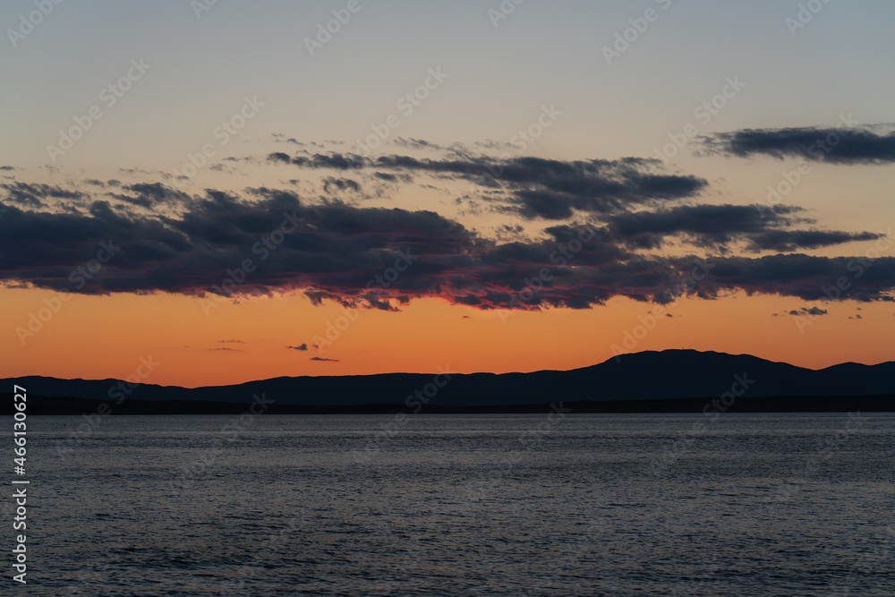 Afterglow over the mountains of the Croatian coast. A summer scene.