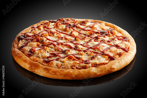 Pizza with barbecue sauce side view.