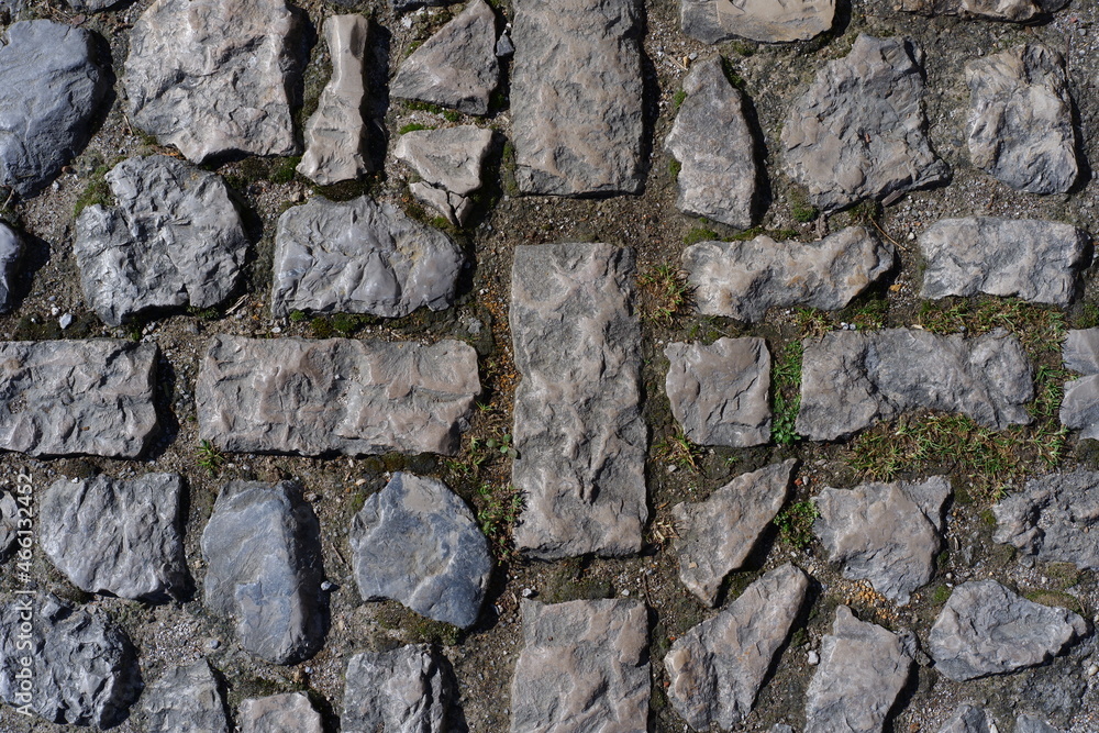 Fototapeta premium Rock texture of an old sidewalk
