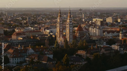 Cinematic aerial view from Votive Church with roofs at daylight in downtown Szeged photo