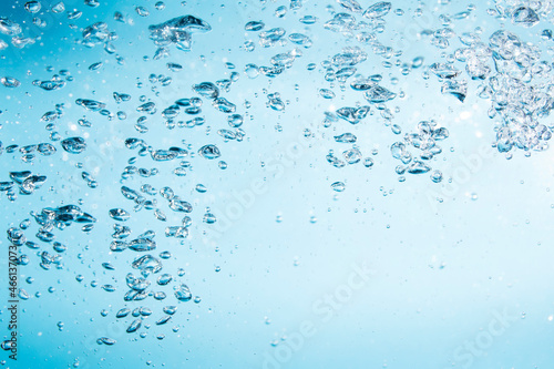 Bubbles of water on blue background