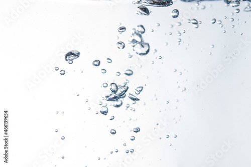 Bubbles of water on blue background