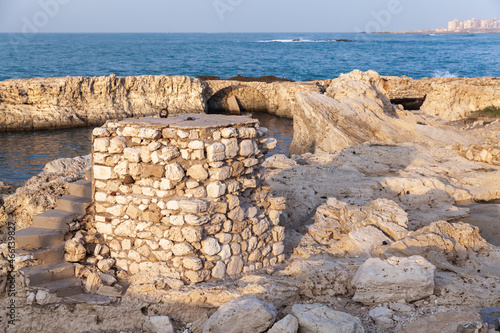 Coastal view with ruined stone fortifications. Egypt photo