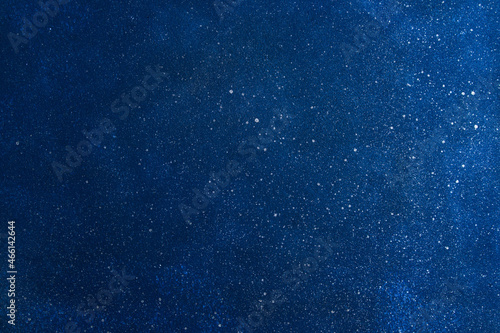 blue abstract gradient background with white splashes, starry sky. High quality photo