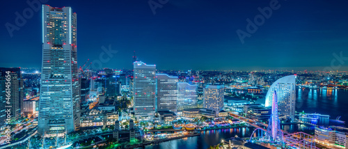 Panoramic view of Yokohama Minato Mirai 21 seaside urban area in central Yokohama with Landmark tower at Magic hour