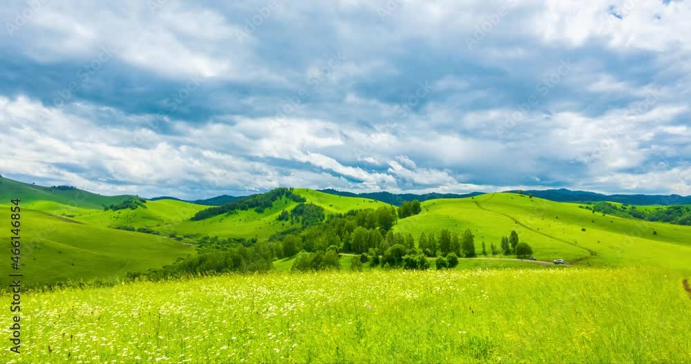 Mountain meadow time-lapse at the summer or autumn time. Wild nature and rural field. Fast clouds movement, green grass and sun rays. Motorised panorama Mountain meadow time-lapse at the summer or autumn time. Wild nature and rural field. Fast clouds movement, green grass and sun rays. Motorised panorama