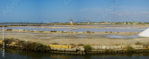 Marsala salt flats view on a summer day, Trapani, Sicily, Italy photo