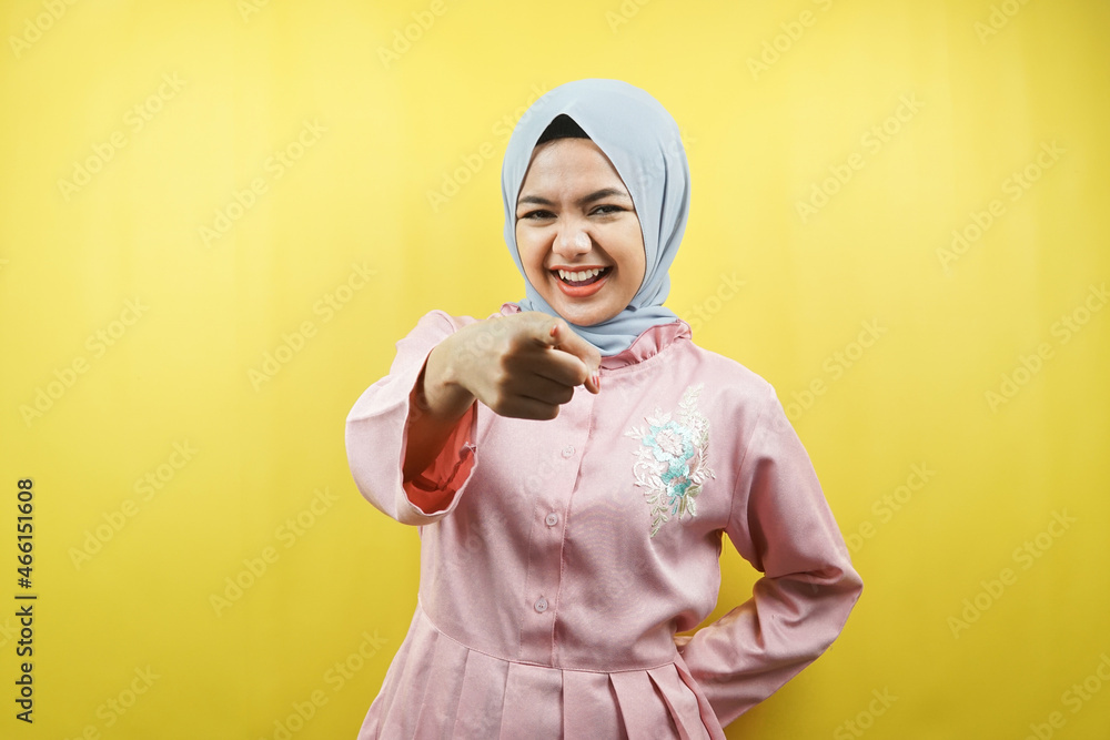 Beautiful young muslim woman with hands pointing at camera isolated Beautiful young muslim woman with hands pointing at camera isolated