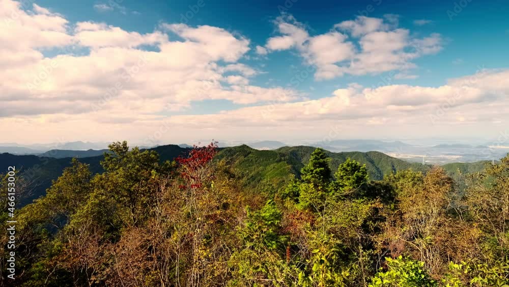 Dramatic landscape of mountains and leaves blowing by wind in autumn or fall, Mt. Ryuo in Kagawa Prefecture in Japan, Nature or Hiking Background Dramatic landscape of mountains and leaves blowing by wind in autumn or fall, Mt. Ryuo in Kagawa Prefecture in Japan, Nature or Hiking Background