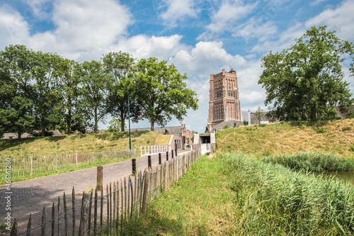 Fotografie The Martinuskerk is a medieval cruciform church in the fortified town of Woudric
