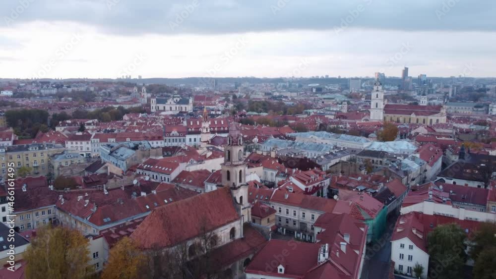 Church Towers In Baroque Architecture In Vilnius, Lithuania, Sunset. UNESCO World Heritage Site. aerial pullback Church Towers In Baroque Architecture In Vilnius, Lithuania, Sunset. UNESCO World Heritage Site. aerial pullback