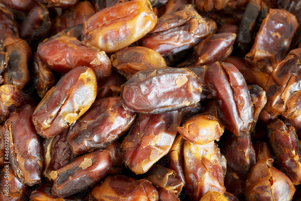 Close up picture of dried dates, selective focus. Close up picture of dried dates, selective focus.