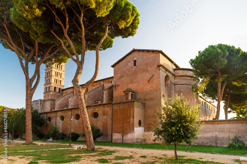 Old Roman church on Aventine Hill in summer, Rome, Italy photo