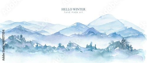 Vertical watercolor panorama in pale blue , grey colors. Winter forest, foggy mountains, hills.