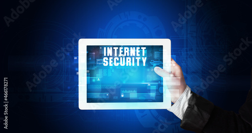 Wallpaper Mural Person holding tablet, security concept Torontodigital.ca