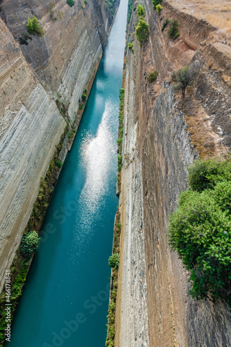 The sun is reflected in the waters of the Corinth Canal
