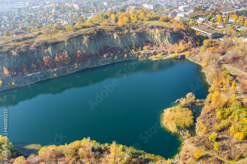 Fototapeta Naklejka Na Ścianę i Meble -  View of the lake in a granite quarry as it looks from above