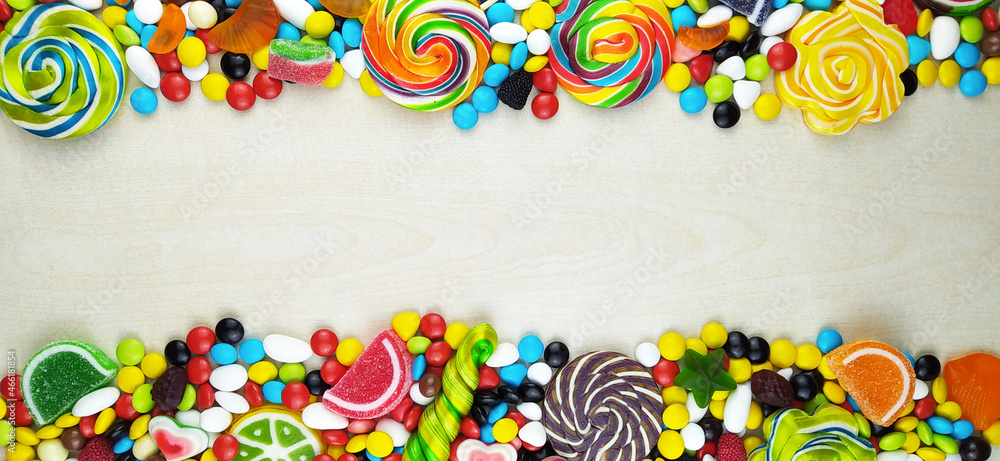 colorful candies and lollipops on a white background