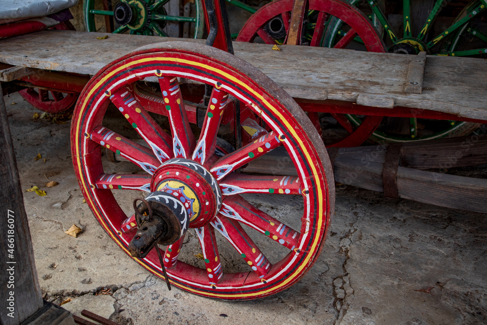 Photo of old ornamented wagon wheel