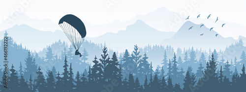 Horizontal banner. Magical misty landscape with paraglider and birds. Silhouettes of trees and mountains. Blue illustration. 