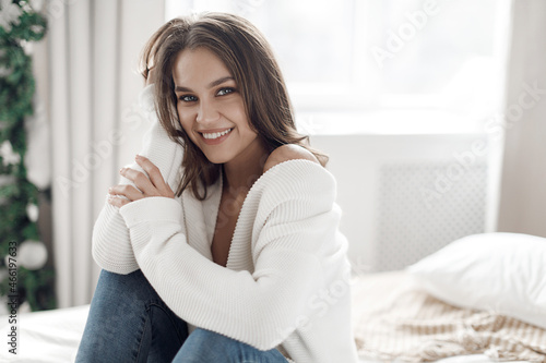 Portrait of a young happy smiling woman at home Free Download Portrait of a young happy smiling woman at home - GFXLoad