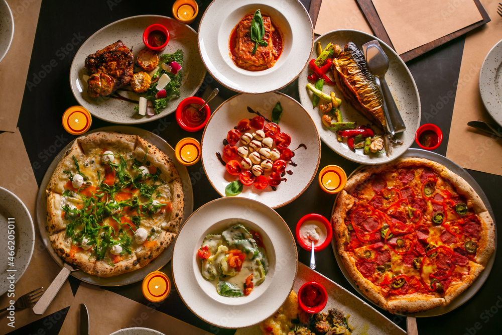 Top down view on enormous buffet of delicious freshly prepared european cuisine Top down view on enormous buffet of delicious freshly prepared european cuisine