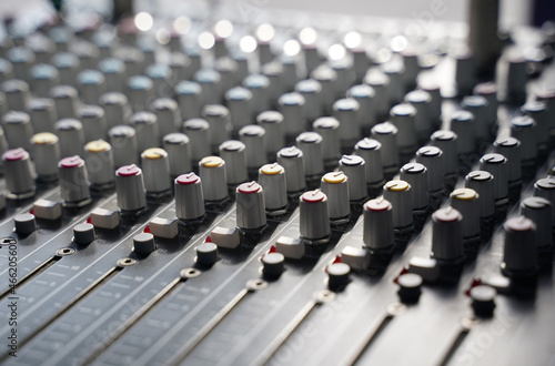 Music console controls on a white background.