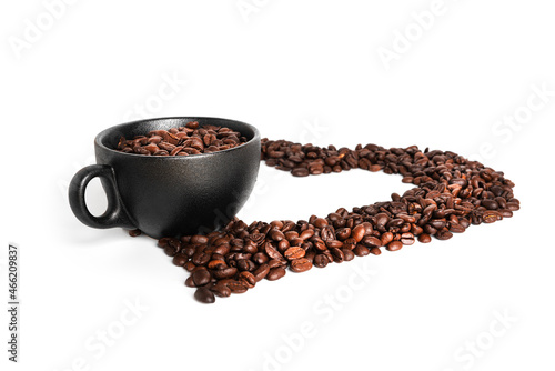Coffee beans on white background. Coffee isolated. Heart of coffee beans. Cup with coffee beans.