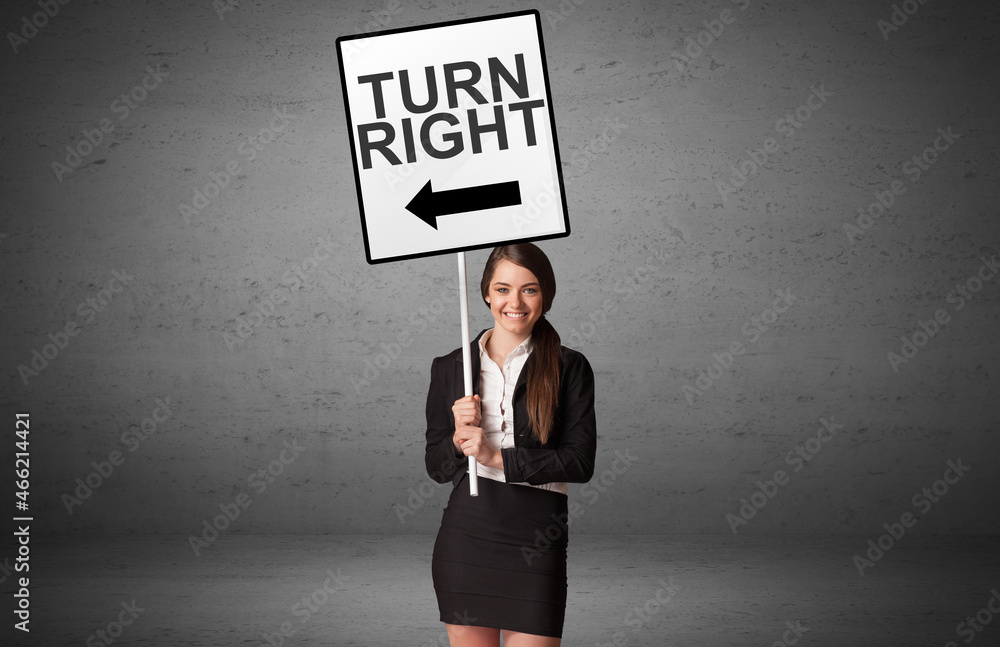 business person holding a traffic sign business person holding a traffic sign
