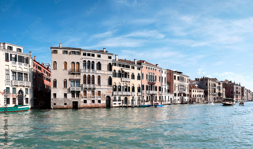 Architecture of Venice, Italy. Historic houses reflects in the water, traditional architecture on Grand Canal in Venice.
