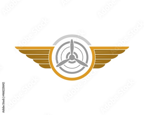 Circle shape with spread wings and propeller inside