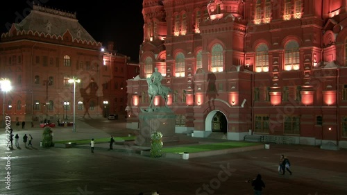 Moscow, Russia - 18 August 2018: Monument to Georgy Zhukov near Historical Museum on Red Square of Moscow near walls of Kremlin on background of black sky at night .