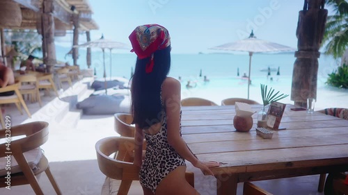Pretty Girl In Swimming Suit and sunglasses Alone In Resort Sunny Day SlowMotion