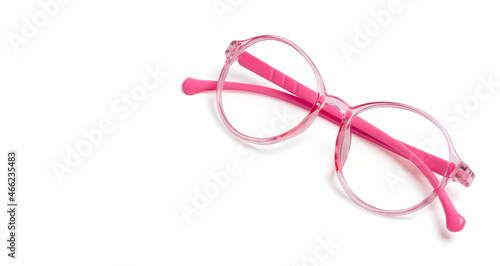 Pink frame eyeglasses for kid on white background.
