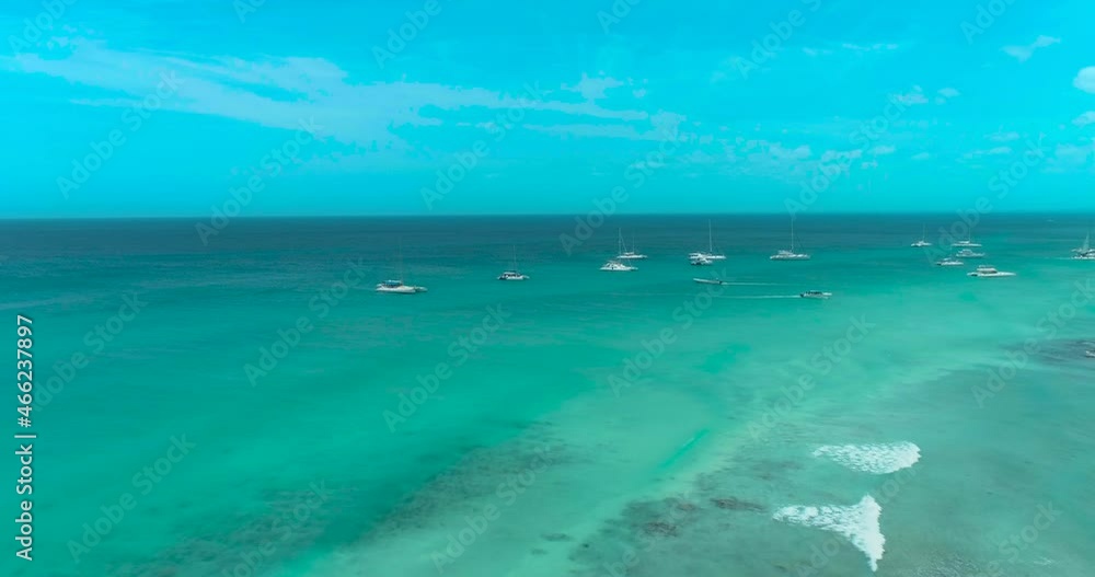 Private Yacht Boats on a Tropical Island with Palm Trees and Blue Water (Aerial Drone View in 4k) Private Yacht Boats on a Tropical Island with Palm Trees and Blue Water (Aerial Drone View in 4k)