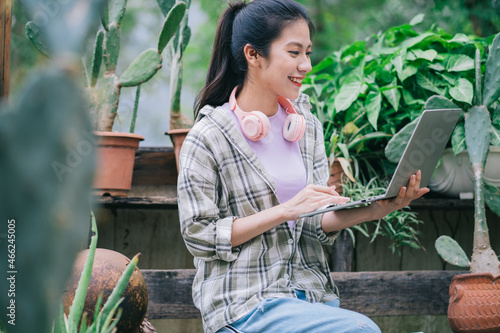 Young Asian woman working in the garden