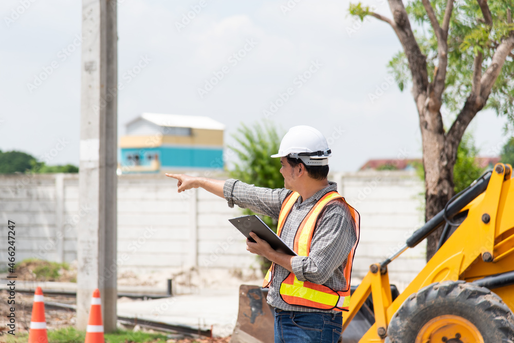 Man construction engineer at construction site