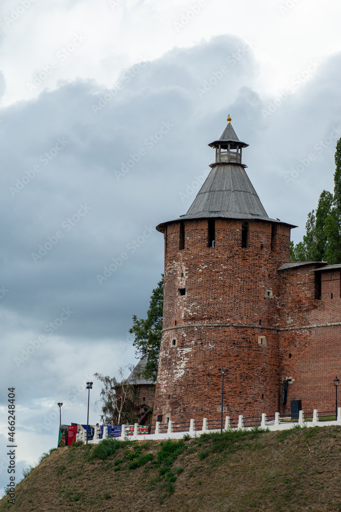 The tower of the Nizhny Novgorod Kremlin made of red brick