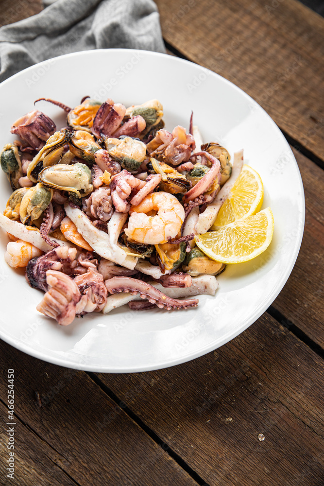 seafood mix shrimp, squid, mussel, octopus ready to eat meal snack on the table copy space food background seafood mix shrimp, squid, mussel, octopus ready to eat meal snack on the table copy space food background