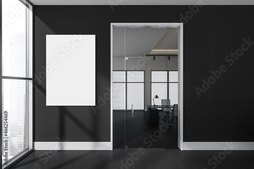 Black and white office corridor with poster on wall