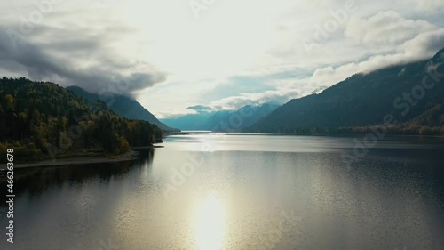 Lake at sunset. Autumn yellow trees. the mountains. Aerial top view. Teletskoye lake Altai. High quality 4k footage