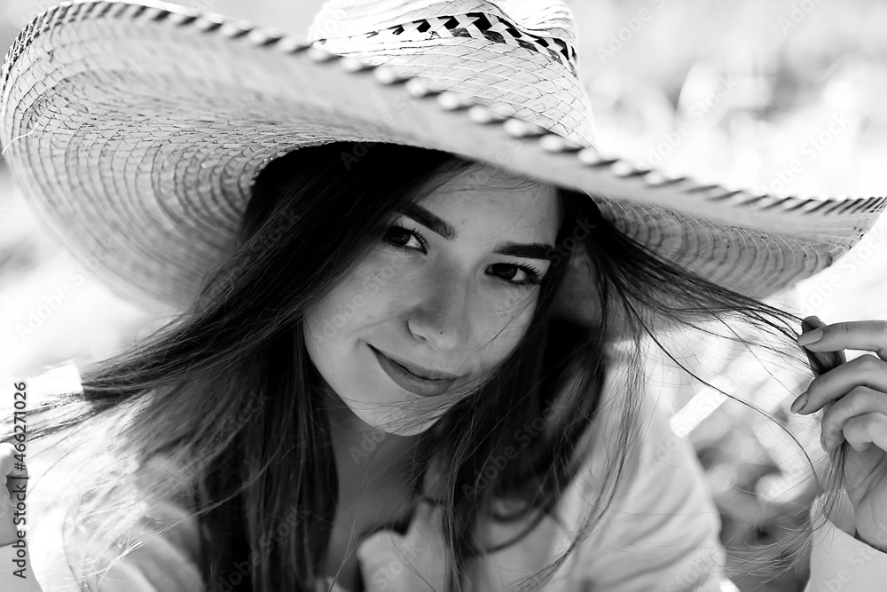 black and white portrait of a cheerful girl country style, freedom young female in a field of straw black and white portrait of a cheerful girl country style, freedom young female in a field of straw