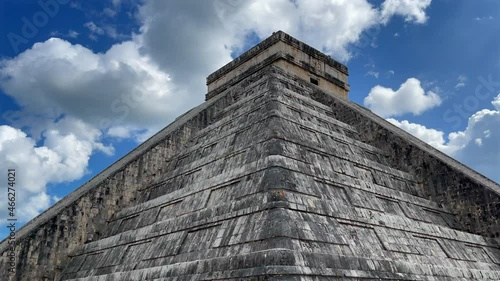 Tilt up of the Kukulcan temple or Chichen Itza in Mexico