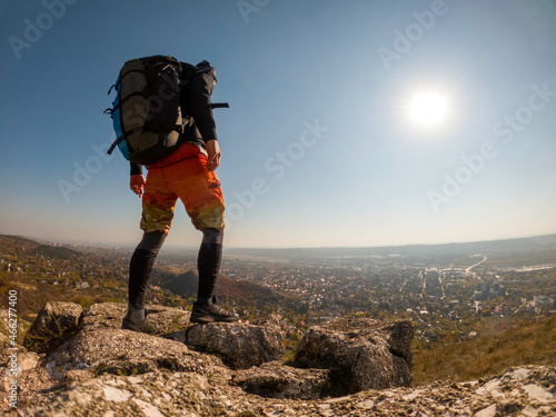 Adventure man with back pack in mountain top. Budapest, Hungary