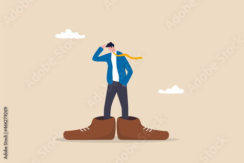 Work responsibility, put right man in the right job, working skill to fit job position, anticipation to be promoted, mistake or problem concept, frustrated businessman trying to put too big shoes.