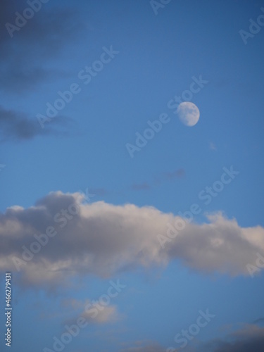 moon and clouds in beautiful sky its blue sky color very interesting 