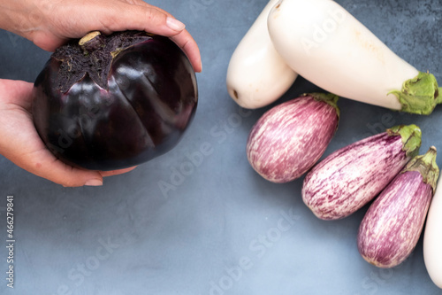 one round and five oval eggplant white and violet concept a variety of healthy food