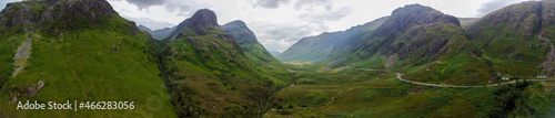 Aerial panoramic view of the waterfalls on the River Coe near Allt-na-ruigh with the Three Sisters in the background, Scotland © Julian Gazzard